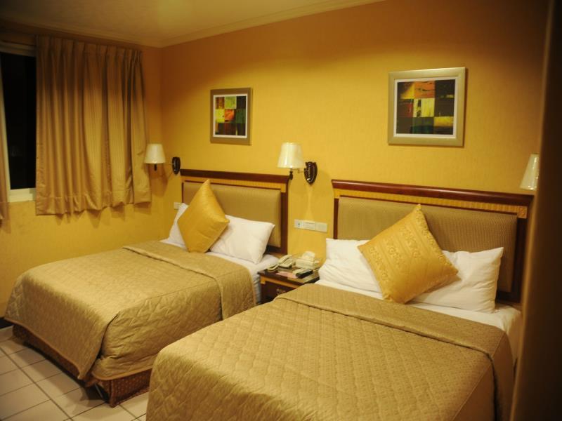 Puti Commercial Hotel Лонгтан Екстериор снимка