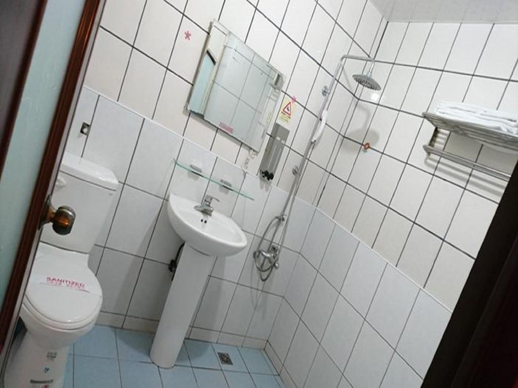 Puti Commercial Hotel Лонгтан Екстериор снимка
