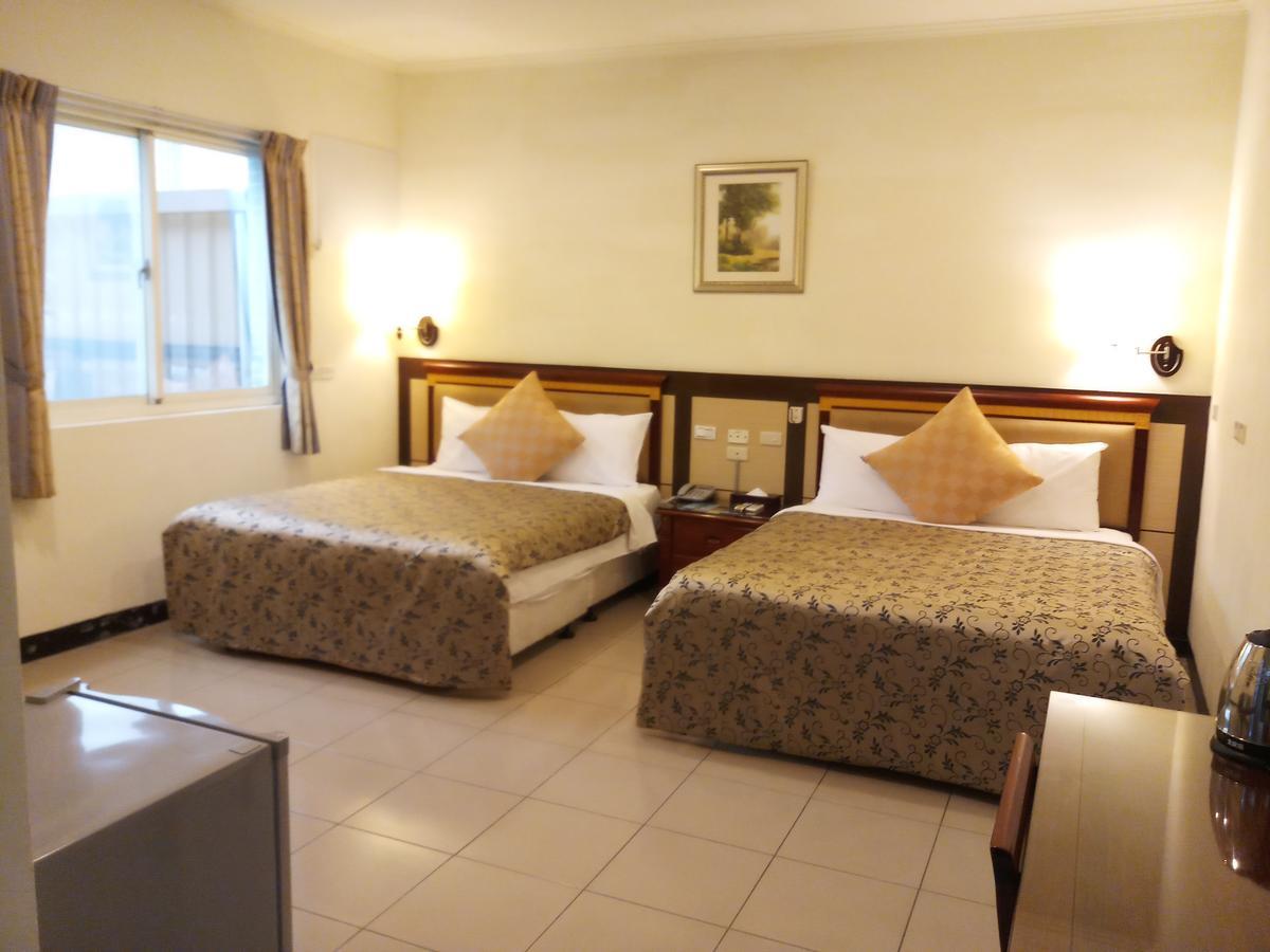 Puti Commercial Hotel Лонгтан Екстериор снимка