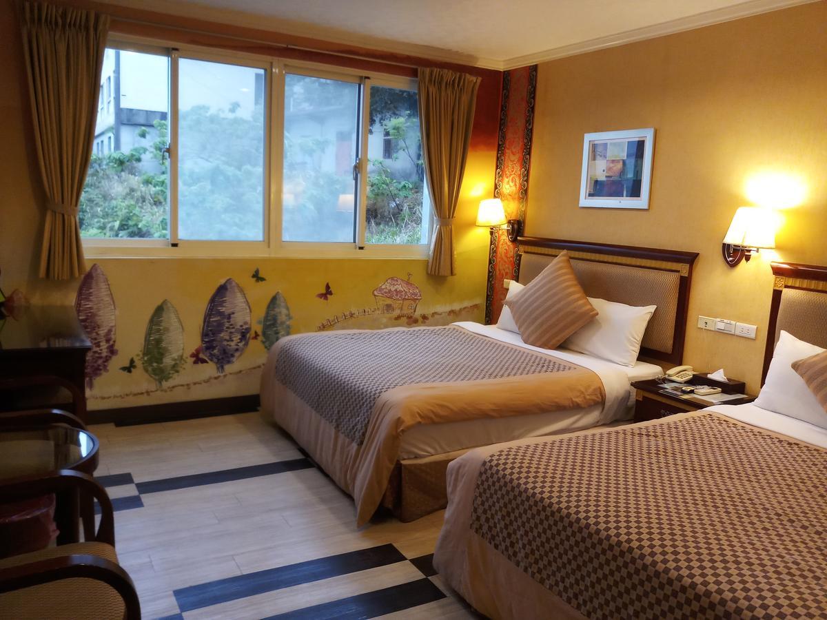 Puti Commercial Hotel Лонгтан Екстериор снимка